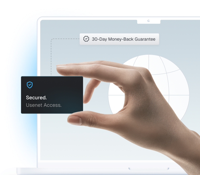A closeup of somebody’s hand that appears to be holding a box that says, “Secured. Usenet Access.” There is a laptop in the background with a wireframe of a globe and a floating box that says, “30-Day Money-Back Guarantee.”